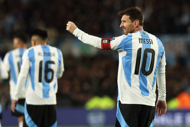 Argentina s forward Lionel Messi R celebrates after scoring the team™s third goal during the South American qualification football match between Argentina and Venezuela for the FIFA World Cup 2026 at the Monumental stadium in Buenos Aires on September 4, 2025 BUENOS AIRES ARGENTINA Copyright: xALEJANDROxPAGNIx