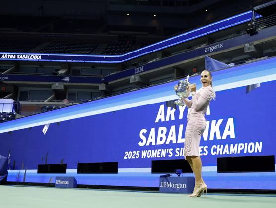 Aryna Sabalenka of Belarus gets spruced up,and brings her US Open Championship Trophy into Arthur Ashe Stadium for photos after defeating Amanda Anisimova at the Women s Finals of the 2025 US Open Tennis Championship in Arthur Ashe Stadium at the USTA Billie Jean King National Tennis Center in Flushing Meadows, New York on Saturday, September 6, 2025. Sabalenka defeated Anisimova 6-3, 7-6 to win her second consecutive US Open Championship.  NYP202509062205 JOHNxANGELILLO