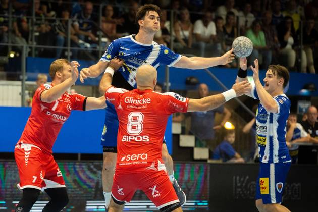 Eisenach , 070925 , 1 Handball Bundesliga THSV Eisenach vs MT Melsungen In the picture Dainis Kristopans and Adrian Sipos Melsungen vs Stephan Seitz and Felix Aelen Eisenach