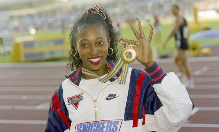 950806 Athletics, World Championships 1995 Gothenburg World Athletics Championships 1995, Gothenburg, Sweden Womens 100 meters hurdles final Gold medalist Gail Devers of USA celebrates with her medal Photo BILDBYRAN M020 05 M020 06 scanx athletics athletics vm vm95 vm1995 vm 1995 vm 95 athletics vm göteborg nya ullevi 1995 world athletics championships 1995 track and field gothenburg sweden bbeng dia august 6 1995  Copyright: BILDBYRAN BB950806BB045