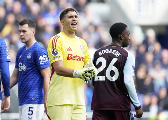 Liverpool, England, 13th September 2025. Emiliano Martinez of Aston Villa (C) during the Everton vs Aston Villa Premier League match at Hill Dickinson Stadium, Liverpool. Picture credit should read: Andrew Yates Sportimage EDITORIAL USE ONLY. No use with unauthorised audio, video, data, fixture lists, club league logos or live services. Online in-match use limited to 120 images, no video emulation. No use in betting, games or single club league player publications. SPI_004_AY_EVERTON_VILLA SPI-4134-0004