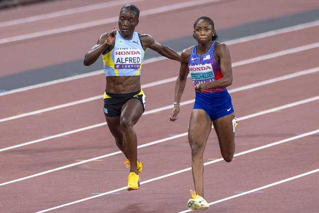 Day 2 - World Athletics Championships Tokyo 2025 Melissa Jefferson-Wooden (R) of the United States and Julien Alfred of Saint Lucia compete in the women s 100-meter final at the World Athletics Championships at the National Stadium in Tokyo on Sept. 14, 2025 Tokyo Japan  Copyright: xAndrzejxIwanczukx originalFilename:iwanczuk-day2worl250915_npg97