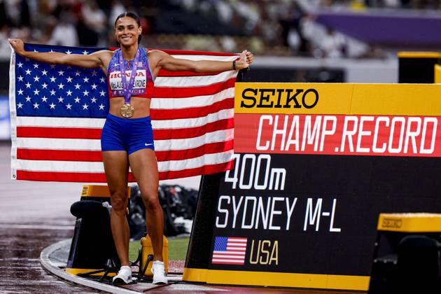 winner Sydney Mclaughlin Levrone of United States of America with a championship record and celebrating and holding flag after competing in the Women s 400 Metres Final during World Athletics Championships Tokyo 2025 of the Day 6 at Japan National Stadium on September 18, 2025 in Tokyo, Japan Photo by Marcel ter Bals DeFodi Images