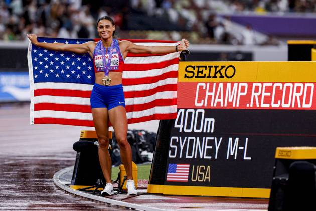 winner Sydney Mclaughlin Levrone of United States of America with a championship record and celebrating and holding flag after competing in the Women s 400 Metres Final during World Athletics Championships Tokyo 2025 of the Day 6 at Japan National Stadium on September 18, 2025 in Tokyo, Japan Photo by Marcel ter Bals DeFodi Images
