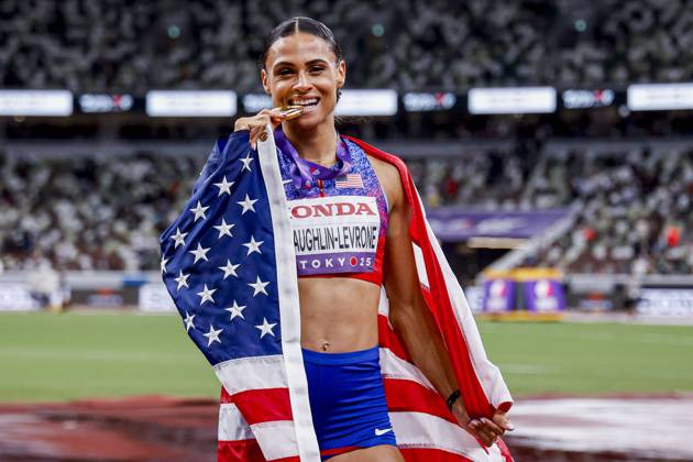 winner Sydney Mclaughlin Levrone of United States of America showing her gold medal and celebrating and holding flag after competing in the Women s 400 Metres Final during World Athletics Championships Tokyo 2025 of the Day 6 at Japan National Stadium on September 18, 2025 in Tokyo, Japan Photo by Marcel ter Bals DeFodi Images