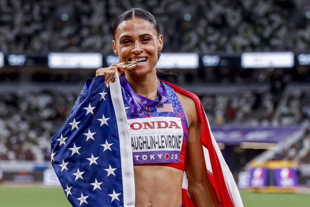winner Sydney Mclaughlin Levrone of United States of America showing her gold medal and celebrating and holding flag after competing in the Women s 400 Metres Final during World Athletics Championships Tokyo 2025 of the Day 6 at Japan National Stadium on September 18, 2025 in Tokyo, Japan Photo by Marcel ter Bals DeFodi Images