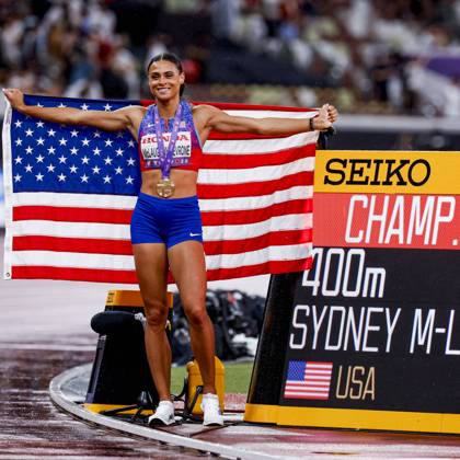 winner Sydney Mclaughlin Levrone of United States of America with a championship record and celebrating and holding flag after competing in the Women s 400 Metres Final during World Athletics Championships Tokyo 2025 of the Day 6 at Japan National Stadium on September 18, 2025 in Tokyo, Japan Photo by Marcel ter Bals DeFodi Images