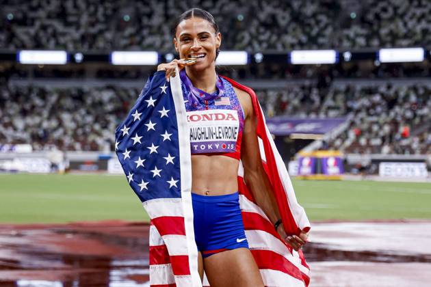 winner Sydney Mclaughlin Levrone of United States of America showing her gold medal and celebrating and holding flag after competing in the Women s 400 Metres Final during World Athletics Championships Tokyo 2025 of the Day 6 at Japan National Stadium on September 18, 2025 in Tokyo, Japan Photo by Marcel ter Bals DeFodi Images