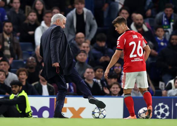 London, England, 30th September 2025. Jose Mourinho manager of Benfica comes onto the pitch to get rid of a second ball during the Chelsea vs Benfica UEFA Champions League match at Stamford Bridge, London. Picture credit should read: David Klein Sportimage EDITORIAL USE ONLY. No use with unauthorised audio, video, data, fixture lists, club league logos or live services. Online in-match use limited to 120 images, no video emulation. No use in betting, games or single club league player publications. SPI_030_DK_Chelsea_Benfica SPI-4176-0030