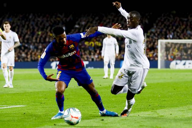 FC Barcelona, Barca v Real Madrid: La Liga BARCELONA, SPAIN - DEC 18: Barcelona s Portuguese defender Nelson Semedo (L) vies with Real Madrid s French midfielder Ferland Mendy (R) during Spanish El Clasico football match between FC Barcelona and Real Madrid at the Camp Nou stadium in Barcelona on December 18, 2019. Spain World. Editorial use only. Please get in touch for any other usage.  Copyright: x2025xAnadoluxADRIAxPUIGx