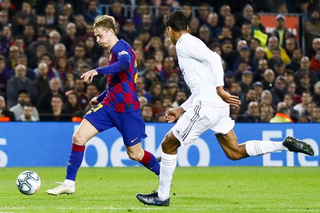 FC Barcelona, Barca v Real Madrid: La Liga BARCELONA, SPAIN - DECEMBER 18: Barcelona s Dutch midfielder Frekie De Jong (L) vies with Real Madrid s French defender Raphael Varane (R) during Spanish El Clasico football match between FC Barcelona and Real Madrid at the Camp Nou stadium in Barcelona on December 18, 2019. Catalonia Spain. Editorial use only. Please get in touch for any other usage.  Copyright: x2025xAnadoluxAdriaxPuigx