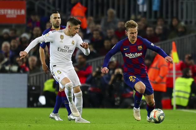 FC Barcelona, Barca v Real Madrid: La Liga BARCELONA, SPAIN - DECEMBER 18: Real Madrid s Brazilian Forward Vinicius Junior (Front L) vies with Barcelona s Dutch midfielder Frekie De Jong (R) during Spanish El Clasico football match between FC Barcelona and Real Madrid at the Camp Nou stadium in Barcelona on December 18, 2019. Catalonia Spain. Editorial use only. Please get in touch for any other usage.  Copyright: x2025xAnadoluxAdriaxPuigx