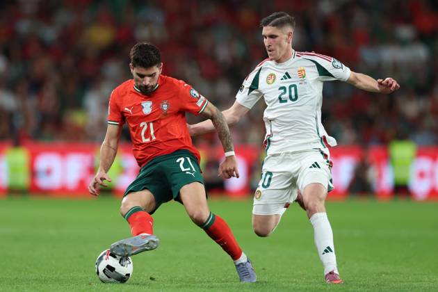POR: Portugal v Hungary. World Cup Qualifiers match. Ruben Neves of Portugal and Roland Sallai of Hungary during the World Cup Qualifiers match between Portugal and Hungary national teams played at Jose Alvalade Stadium on October 14, 2025 in Lisboa, Portugal. Copyright: xMiguelxMarruffox xPRESSINx MM_251014_2526_201