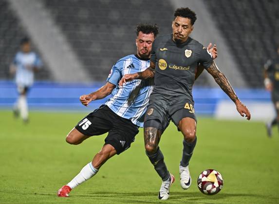 AL WAKRAH SC V AL RAYYAN SC-DOHA BANK STARS LEAGUE QATAR Almahdi Ali Mukhtar (L) of Al-Wakrah SC and Gregore De Magalhaes Favero of Al Rayyan SC in action during the Doha Bank Stars League Qatar match between Al Wakrah SC and Al Rayyan SC at Saoud Bin Abdulrahman Stadium in Doha, Qatar, on October 26, 2025. DOHA Qatar Copyright: xNOUSHADx