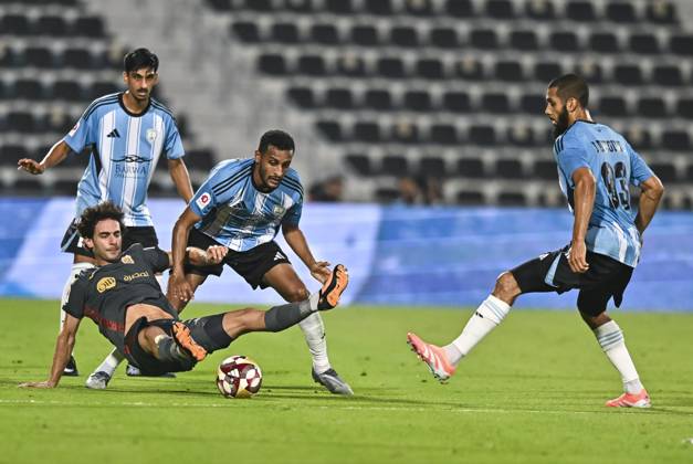AL WAKRAH SC V AL RAYYAN SC-DOHA BANK STARS LEAGUE QATAR Almahdi Ali Mukhtar (C) of Al-Wakrah SC and Ahmed Alaaeildin Abdelmotaal (L) of Al Rayyan SC in action during the Doha Bank Stars League Qatar match between Al Wakrah SC and Al Rayyan SC at Saoud Bin Abdulrahman Stadium in Doha, Qatar, on October 26, 2025. DOHA Qatar Copyright: xNOUSHADx