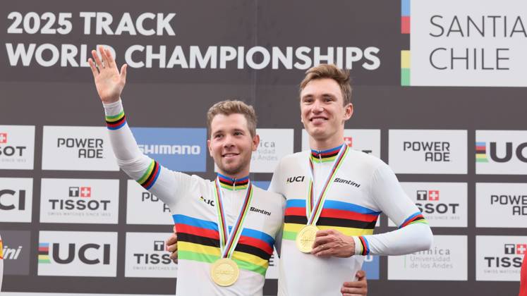 Belgian Fabio Van Den Bossche and Belgian Lindsay De Vylder celebrate celebrate on the podium with their gold medals and wearing the world champion jersey, on the podium of the final of the men s Madison race at the 2025 UCI Track World Championships cycling, in Santiago, Chile, Sunday 26 October 2025. The Track World Championships take place from 22 to 26 October at the Velodromo de Penalolen in Santiago, Chile. BENOITxDOPPAGNE x138051395x