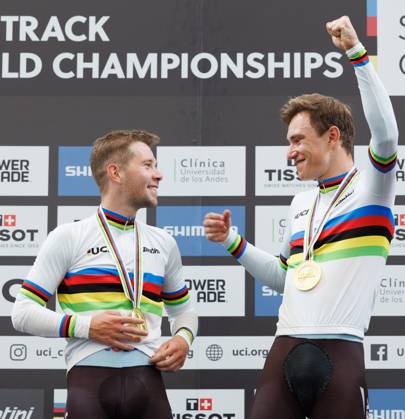 Belgian Fabio Van Den Bossche and Belgian Lindsay De Vylder celebrate on the podium after winning the podium ceremony of the men s Madison race at the 2025 UCI Track World Championships cycling, in Santiago, Chile, Sunday 26 October 2025. The Track World Championships take place from 22 to 26 October at the Velodromo de Penalolen in Santiago, Chile. BENOITxDOPPAGNE x138051518x