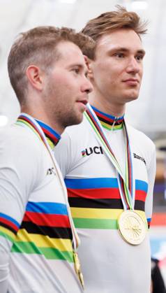 Belgian Fabio Van Den Bossche and Belgian Lindsay De Vylder pictured after winning the podium ceremony of the men s Madison race at the 2025 UCI Track World Championships cycling, in Santiago, Chile, Sunday 26 October 2025. The Track World Championships take place from 22 to 26 October at the Velodromo de Penalolen in Santiago, Chile. BENOITxDOPPAGNE x138056373x
