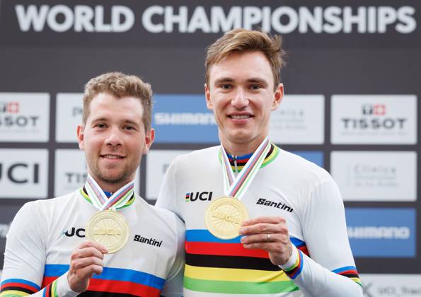 Belgian Fabio Van Den Bossche and Belgian Lindsay De Vylder celebrate on the podium after winning the podium ceremony of the men s Madison race at the 2025 UCI Track World Championships cycling, in Santiago, Chile, Sunday 26 October 2025. The Track World Championships take place from 22 to 26 October at the Velodromo de Penalolen in Santiago, Chile. BENOITxDOPPAGNE x138056445x