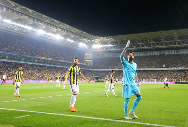 Fenerbahce v Besiktas: Ziraat Turkish Cup ISTANBUL, TURKEY - APRIL 19: Mehmet Topal (2nd R) and Volkan Demirel (R) of Fenerbahce warn the fans after they throw objects to pitch during Ziraat Turkish Cup Semi Final second leg soccer match between Fenerbahce and Besiktas at the Ulker Stadium in Istanbul, Turkey on April 19, 2018. The match was cancelled after the latest incidents. Istanbul Turkey. Editorial use only. Please get in touch for any other usage. Copyright: x2025xAnadoluxMetinxPalax