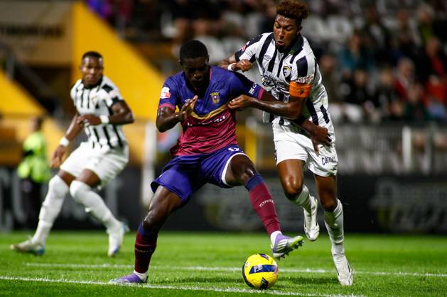 Liga Portugal 2: Portimonense - Torreense Portimao, Portugal - 30 10 2025: Liga Portugal 2 Meu Super 9th round match between SC Portimonense and SCU Torreense at Estadio Municipal de Portimao 93 Torreense attacker, Mohamed Ali Diade comes in to stop 9 Portimonense attacker, Tamble Ulisses Folgado Monteiro Mandatory Credit: Toby Tande Avant Sports Agency Portimao Estadio Municipal de Portimao Portugal Copyright: xTobyxTandex