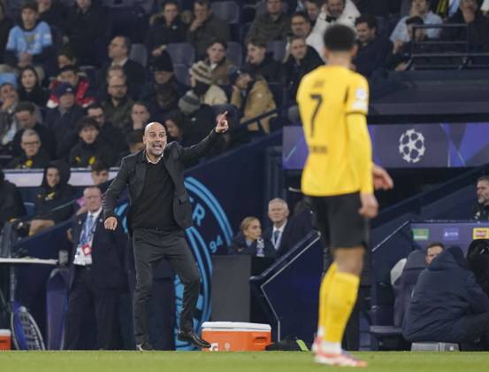 Manchester, England, 5th November 2025. Pep Guardiola coach of Manchester City shouts instructions during the Manchester City vs Borussia Dortmund UEFA Champions League match at the Etihad Stadium, Manchester. Picture credit should read: Andrew Yates Sportimage EDITORIAL USE ONLY. No use with unauthorised audio, video, data, fixture lists, club league logos or live services. Online in-match use limited to 120 images, no video emulation. No use in betting, games or single club league player publications. SPI_061_AY_Man_City_Dortmund SPI-4268-0119