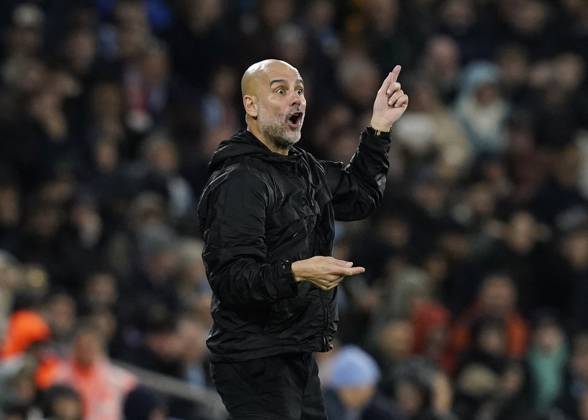 Manchester, England, 9th November 2025. Pep Guardiola coach of Manchester City sends out instructions during the Manchester City vs Liverpool Premier League match at the Etihad Stadium, Manchester. Picture credit should read: Andrew Yates Sportimage EDITORIAL USE ONLY. No use with unauthorised audio, video, data, fixture lists, club league logos or live services. Online in-match use limited to 120 images, no video emulation. No use in betting, games or single club league player publications. SPI_080_AY_Man_City_Liverpool SPI-4280-0076