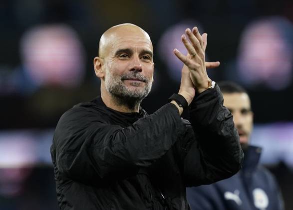Manchester, England, 9th November 2025. Pep Guardiola coach of Manchester City claps the fans during the Manchester City vs Liverpool Premier League match at the Etihad Stadium, Manchester. Picture credit should read: Andrew Yates Sportimage EDITORIAL USE ONLY. No use with unauthorised audio, video, data, fixture lists, club league logos or live services. Online in-match use limited to 120 images, no video emulation. No use in betting, games or single club league player publications. SPI_086_AY_Man_City_Liverpool SPI-4280-0082