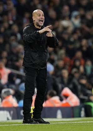 Manchester, England, 9th November 2025. Pep Guardiola coach of Manchester City during the Manchester City vs Liverpool Premier League match at the Etihad Stadium, Manchester. Picture credit should read: Andrew Yates Sportimage EDITORIAL USE ONLY. No use with unauthorised audio, video, data, fixture lists, club league logos or live services. Online in-match use limited to 120 images, no video emulation. No use in betting, games or single club league player publications. SPI_103_AY_Man_City_Liverpool SPI-4280-0110
