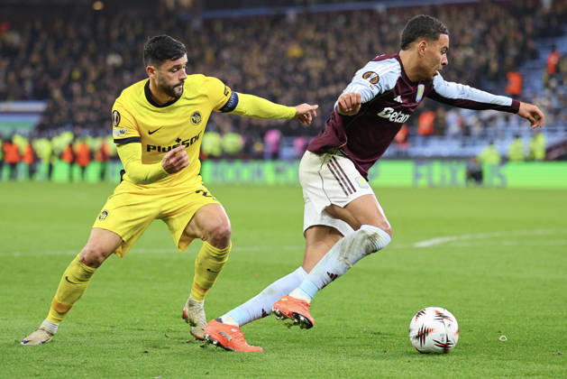 Birmingham, England, 27th November 2025. Morgan Rogers of Aston Villa and Loris Benito of Young Boys during the Aston Villa vs Young Boys UEFA Europa League match at Villa Park, Birmingham. Picture credit should read: James Baylis Sportimage EDITORIAL USE ONLY. No use with unauthorised audio, video, data, fixture lists, club league logos or live services. Online in-match use limited to 120 images, no video emulation. No use in betting, games or single club league player publications. SPI_047_JB_VILLA_YOUNGBOYS SPI-4329-0048