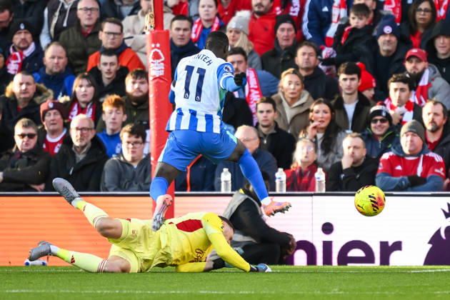 Nottingham, England, 30th November 2025. Matz Sels, Nottingham Forest goalkeeper saves at the feet of Yankuba Minteh of Brighton during the Nottingham Forest vs Brighton and Hove Albion Premier League match at the City Ground, Nottingham. Picture credit should read: Craig Thomas Sportimage EDITORIAL USE ONLY. No use with unauthorised audio, video, data, fixture lists, club league logos or live services. Online in-match use limited to 120 images, no video emulation. No use in betting, games or single club league player publications. SPI_020_CT_Nottingham_Forest_vs_Brighton_and_Hove_Albion SPI-4337-0031