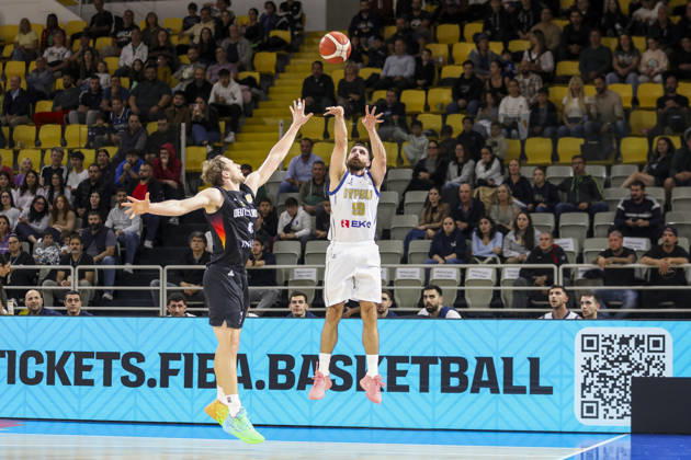 FIBA World Cup Qualifiers : Cyprus vs Germany NIKOS STYLIANOU of Cyprus shots a 3-pointer. Cyprus plays vs Germany for the Group E of the FIBA Basketball World Cup European Qualifiers, at Spyros Kyprianou Arena, Limassol, Cyprus, on Dec. 1, 2025.. Cyprus plays vs Germany for the Group E of the FIBA Basketball World Cup European Qualifiers, at Spyros Kyprianou Arena, Limassol, Cyprus, on Dec. 1, 2025. Limassol Cyprus Copyright: xKOSTASxPIKOULASx