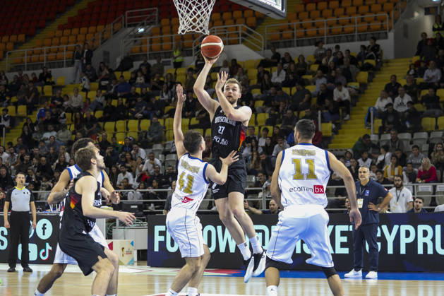 FIBA World Cup Qualifiers : Cyprus vs Germany TILL PAPE of Germany scores in front of GEORGIOS TRETIAKOV of Cyprus abd MICHALIS KOUMIS of Cyprus. Cyprus plays vs Germany for the Group E of the FIBA Basketball World Cup European Qualifiers, at Spyros Kyprianou Arena, Limassol, Cyprus, on Dec. 1, 2025. Limassol Cyprus Copyright: xKOSTASxPIKOULASx