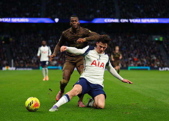 6th December 2025; Tottenham Hotspur Stadium, London, England; Premier League Football, Tottenham Hotspur versus Brentford; Michael Kayode of Brentford tackled by Archie Gray of Tottenham Hotspur  JohnxPatrickxFletcher