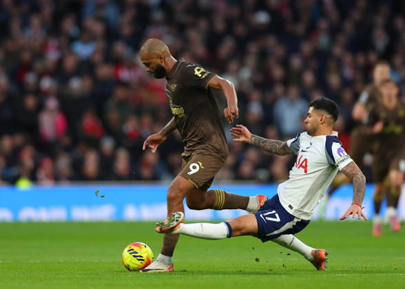 6th December 2025; Tottenham Hotspur Stadium, London, England; Premier League Football, Tottenham Hotspur versus Brentford; Cristian Romero of Tottenham Hotspur tackles Igor Thiago of Brentford  JohnxPatrickxFletcher