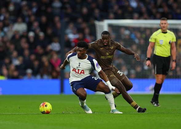 6th December 2025; Tottenham Hotspur Stadium, London, England; Premier League Football, Tottenham Hotspur versus Brentford; Mohammed Kudus of Tottenham Hotspur closely marked by Michael Kayode of Brentford  JohnxPatrickxFletcher
