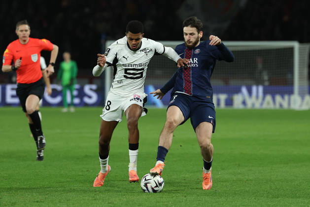FBL FRA LIGUE1 Paris Saint Germain Stade Rennes Abdelhamid Ait Boudlal Stade Rennes , Khvicha Kvaratskhelia Paris Saint Germain mbattle for the ball during the French L1 football match between Paris Saint Germain PSG an Stade Rennes at Parc des Princes Paris ,France, on December 06, 2025 Copyright: JoaquimxFerreira
