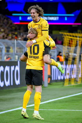 10 12 2025, Football, UEFA Champions League, Borussia Dortmund FK Bodö Glimt, BVB Stadion, Matchday 5, Season 2025 2026 Goal celebration after the 1-0 goal by scorer Julian Brandt BVB 10 together with Fabio Silva BVB 21 Regulations prohibit any use of photographs as image sequences and or quasi video North Rhine-Westphalia Germany