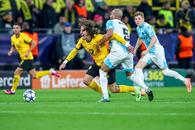 10 12 2025, Football, UEFA Champions League, Borussia Dortmund FK Bodö Glimt, BVB Stadion, Matchday 5, Season 2025 2026 Fabio Silva BVB 21 in duel against Haitam Aleesami Bodo Glimt 05 Regulations prohibit any use of photographs as image sequences and or quasi video North Rhine-Westphalia Germany