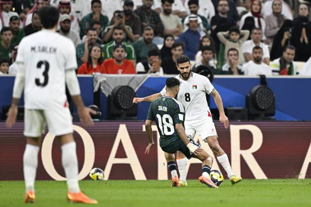 Palestine v Saudi Arabia - 2025 FIFA Arab Cup LUSAIL, QATAR - DECEMBER 11: Hamed Hamdan (8) of Palestine in action during their 2025 FIFA Arab Cup quarterfinal match between Palestine and Saudi Arabia at Lusail Stadium in Lusail, Qatar on December 11, 2025. Stringer Anadolu Lusail Qatar. Editorial use only. Please get in touch for any other usage.  Copyright: x2025xAnadoluxStringerx
