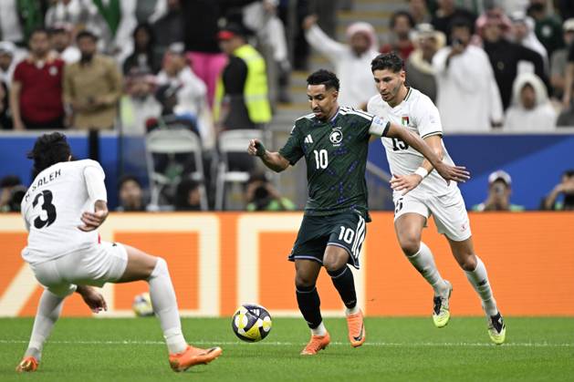 Palestine v Saudi Arabia - 2025 FIFA Arab Cup LUSAIL, QATAR – DECEMBER 11: Salem Al Dawsari (L) of Saudi Arabia in action during their 2025 FIFA Arab Cup quarterfinal match between Palestine and Saudi Arabia at Lusail Stadium in Lusail, Qatar on December 11, 2025. Stringer Anadolu Lusail Qatar. Editorial use only. Please get in touch for any other usage.  Copyright: x2025xAnadoluxStringerx