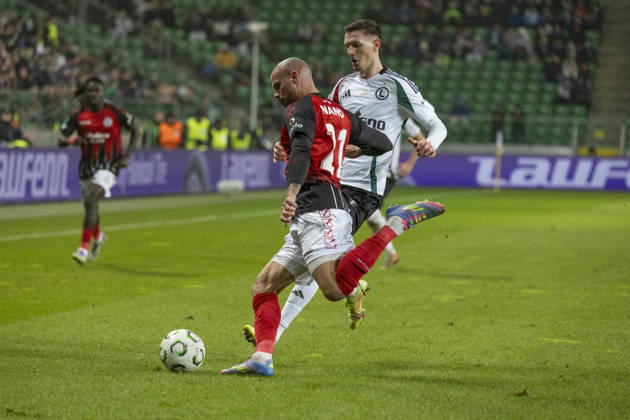 Legia Warszawa - Lincoln Red Imps 18.12.2025 football, Warsaw, UEFA Conference League game Legia Warszawa - Lincoln Red Imps (pilka nozna Liga Konferencji Europy ) image shows: Graeme Torrilla (L) Ermal Krasniqi (R) photo Katarzyna Plewczynska Fotostyk Copyright: xKatarzynaxPlewczynska Fotostykx 20251218FCTKP217