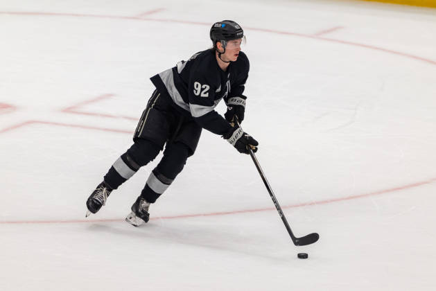 December 13, 2025, Los Angeles, California, United States: LOS ANGELES, CALIFORNIA - DECEMBER 13: Defenseman Brandt Clarke 92 of the Los Angeles Kings skates with the puck during a game between the Calgary Flames and Los Angeles Kings at Crypto.com Arena on December 13, 2025, in Los Angeles, California. Calgary Flames V Los Angeles Kings  - ZUMAt139 20251213_aaa_t139_010 Copyright: xJordanxTeller IsixPhotosx