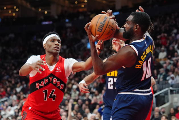 December 31, 2025, Toronto, On, CANADA: Toronto Raptors guard Ja Kobe Walter (14) battles with Denver Nuggets guard forward Tim Hardaway Jr. (10) for control of the ball during second half NBA, Basketball Herren, USA action in Toronto on Wednesday December 31, 2025. Canada News - December 31, 2025  - ZUMAc35_ 20251231_zaf_c35_068 Copyright: xFrankxGunnx