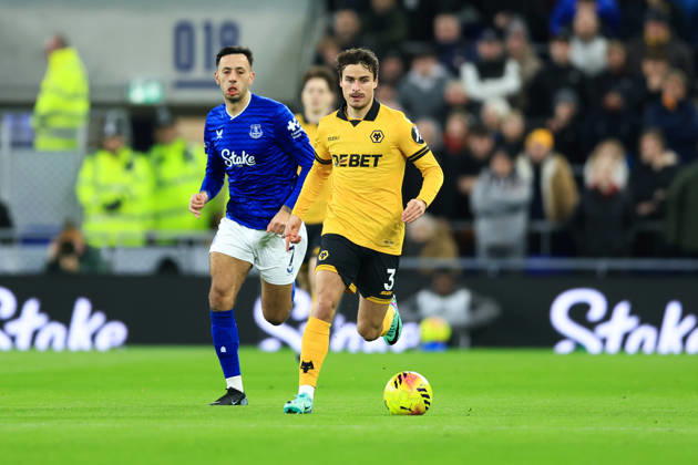 Liverpool, England, 7th January 2026. Hugo Bueno of Wolverhampton Wanderers runs with the ball whilst under pressure from Dwight McNeil of Everton during the Everton vs Wolverhampton Wanderers Premier League match at Hill Dickinson Stadium, Liverpool. Picture credit should read: Jessica Hornby Sportimage EDITORIAL USE ONLY. No use with unauthorised audio, video, data, fixture lists, club league logos or live services. Online in-match use limited to 120 images, no video emulation. No use in betting, games or single club league player publications. SPI_055_JH_EVERTON_WOLVES SPI-4436-0052