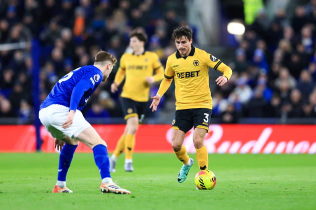 Liverpool, England, 7th January 2026. Hugo Bueno of Wolverhampton Wanderers runs with the ball whilst under pressure from Jake O™Brien of Everton during the Everton vs Wolverhampton Wanderers Premier League match at Hill Dickinson Stadium, Liverpool. Picture credit should read: Jessica Hornby Sportimage EDITORIAL USE ONLY. No use with unauthorised audio, video, data, fixture lists, club league logos or live services. Online in-match use limited to 120 images, no video emulation. No use in betting, games or single club league player publications. SPI_062_JH_EVERTON_WOLVES SPI-4436-0060