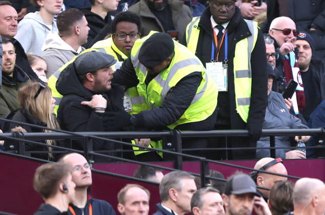 A steward speaks to a West Ham fan after Granit Xhaka (S) (bottom right) had an exchange of views with him at the West Ham United v Sunderland EPL match, at the London Stadium, London, UK on 24th January, 2026. 