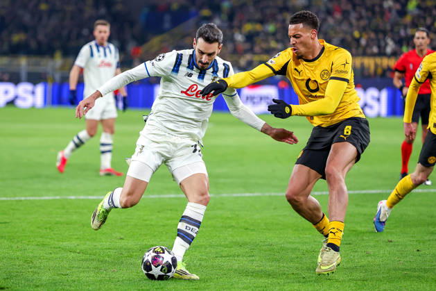 17 02 2026, Football, UEFA Champions League, Borussia Dortmund Atalanta Bergamo, BVB Stadion, Play Offs first leg, Season 2025 2026 Davide Zappacosta Atalanta Bergamo 77 in duel against Felix Nmecha BVB 08 Regulations prohibit any use of photographs as image sequences and or quasi video Nordrhein Westfalen Germany