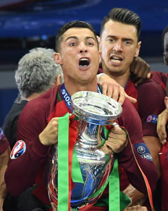 Portugal wins UEFA EURO, EM, Europameisterschaft,Fussball 2016 PARIS, FRANCE - JULY 10: Portugal s forward Cristiano Ronaldo celebrates with the trophy as he poses after Portugal won the Euro 2016 final football match between Portugal and France at the Stade de France in Saint-Denis, north of Paris, on July 10, 2016. Ile-de-France France. Editorial use only. Please get in touch for any other usage. Copyright: x2025xAnadoluxMustafaxYalcinx
