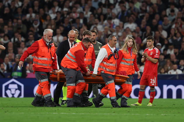 Madrid, Spain February 25, 2026 FBL UEFA Champions League 2025 26 Real Madrid SL Benfica Raul Asencio Real Madrid is carried off the pitch during the UEFA Champions League 2025 26 knockout play offs match between Real Madrid and SL Benfica at the Santiago Bernabà u Stadium on February 25, 2026 in Madrid, Spain Copyright: JoaquimxFerreira